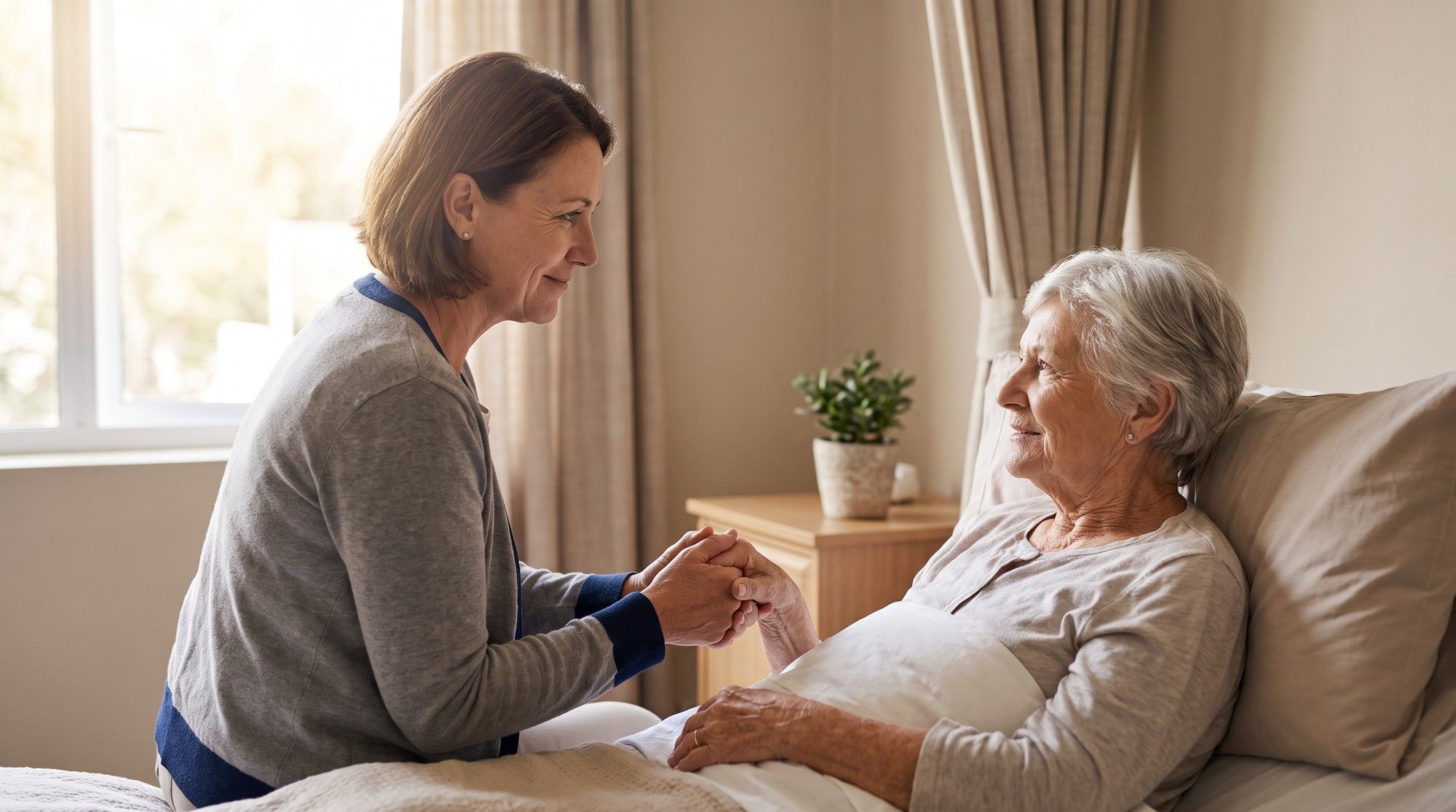 Adult daughter holding her elderly mother's hand at a nursing home bedside. Illustration for Protecting Seniors Across California.